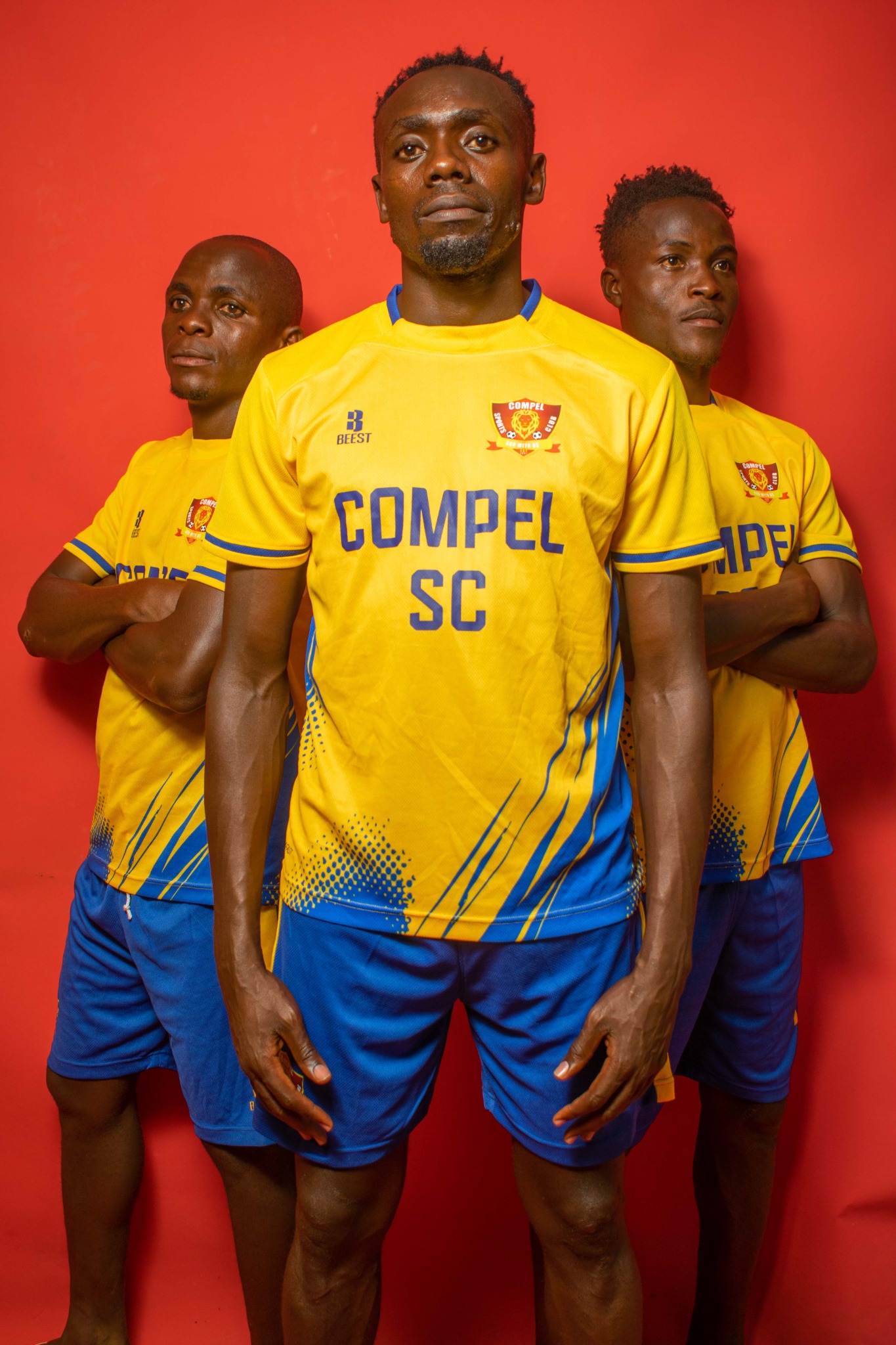 Compel SC players presenting the new away kit